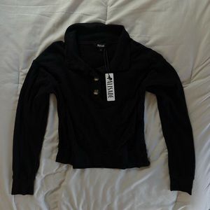 Black button long sleeve top.